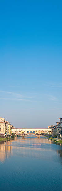 istock Ponte Vecchio bridge Arno blue sky vertical panorama Florence Italy 182194074