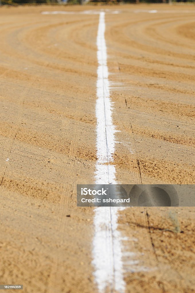 Baseline with circles in dirt Circles in dirt on first base line Backgrounds Stock Photo