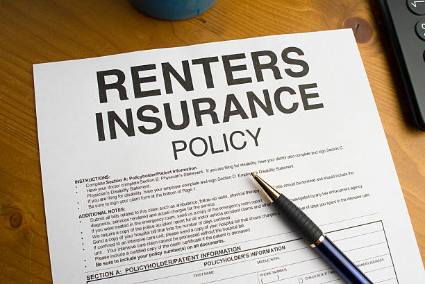 Renters Insurance Policy Official Insurance document on a desktop tenant stock pictures, royalty-free photos & images