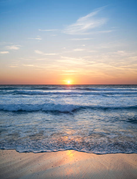 海の夕日 - sand beach sea wave ストックフォトと画像