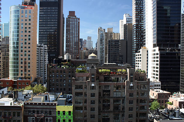 edificios de la ciudad de nueva york - wasserspeicher fotografías e imágenes de stock