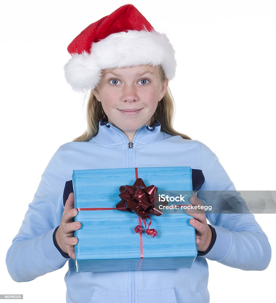 Present Presentation A girl holding a Christmas present. Adolescence Stock Photo