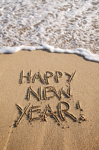 istock Happy New Year Message on Sand with Wave 182196441