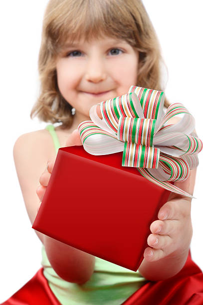 parcela de natal vermelho - elementary age focus on foreground indoors studio shot imagens e fotografias de stock