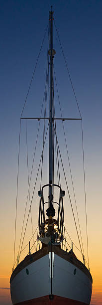 front view of a sailboat in the sunsetCHECK OTHER SIMILAR IMAGES IN MY PORTFOLIO....