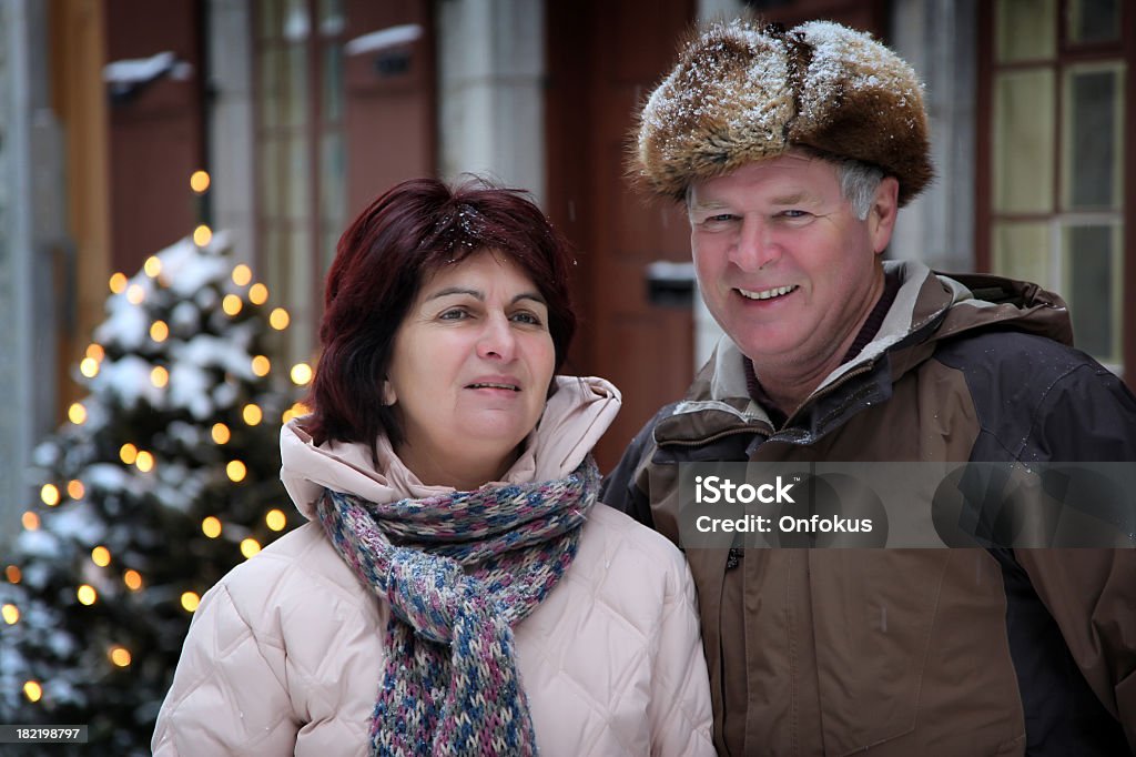 Happy Seniors Couple Outdoor at Christmas Time Happy seniors couple at christmas time, Quebec City, Canada Canada Stock Photo