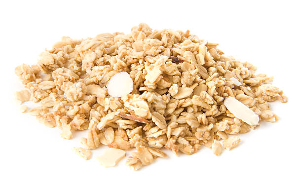istock Pile of granola cereal with almonds on white 182199785