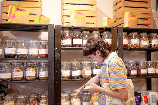 Shopping for daily needs at a zero-waste bulk store