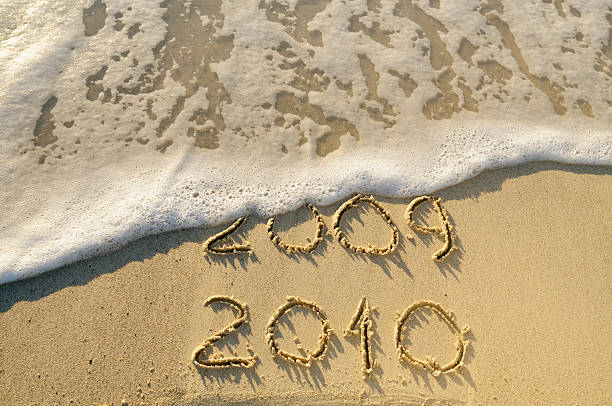 istock 2009-2010 Written in the Sand with a Wave 182199996