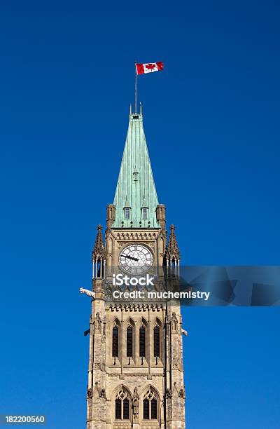 Peace Tower On Parliament In Ottawa Flying Canadian Flag Stock Photo - Download Image Now