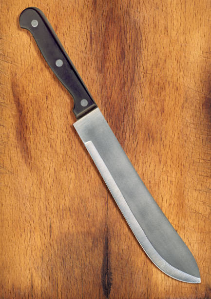 istock Kitchen Knife on Old Wooden Cutting Board 182200747