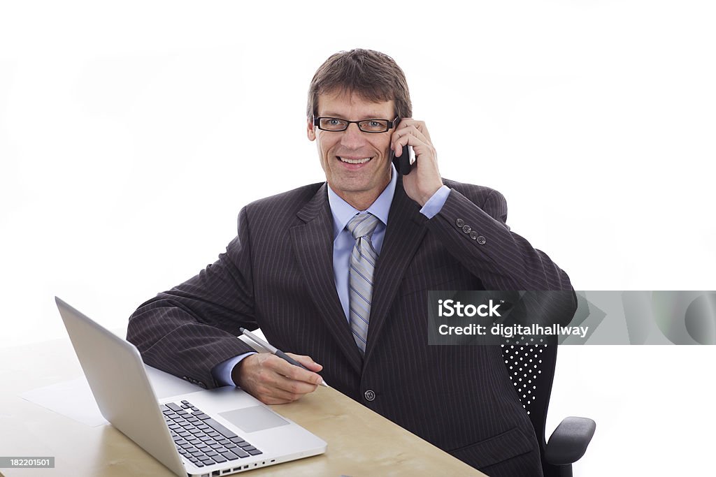 Un hombre de negocios con teléfono celular - Foto de stock de 45-49 años libre de derechos