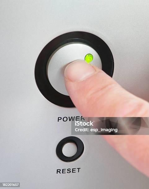 Pressing The Power Switch On Or Off Stock Photo - Download Image Now - Push Button, Adult, Circle