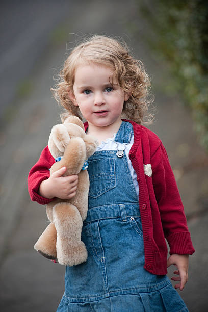 istock Cute little girl with teddy 182201704
