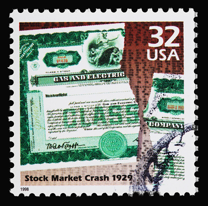 1929 stock market crash stamp on a black background.
