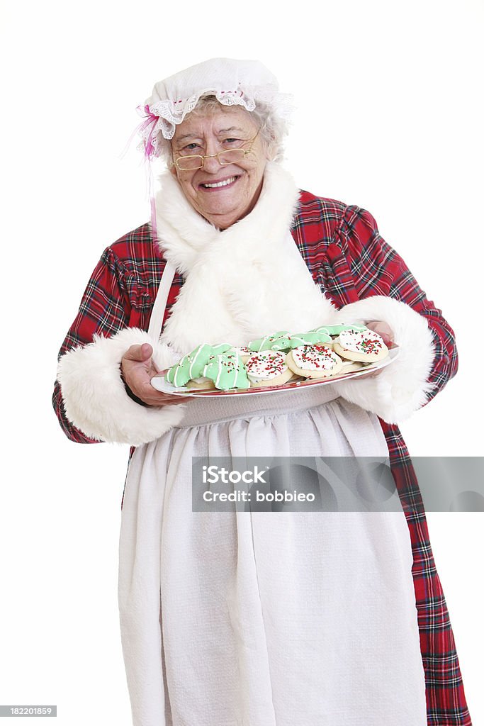 Sênior senhora Papai Noel com cookies - Foto de stock de Mamãe Noel royalty-free
