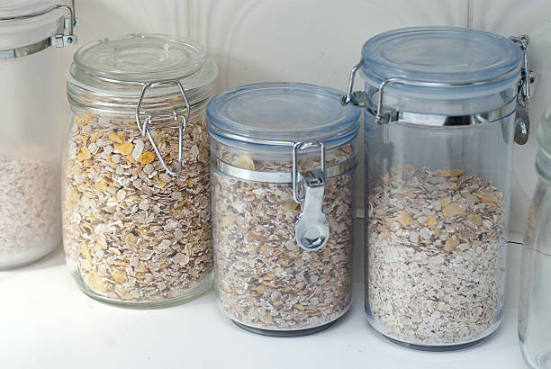 cerials oat flakes storage in jars at kitchen cerials in boxes cerial stock pictures, royalty-free photos & images