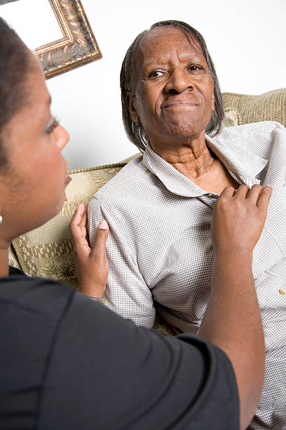istock Patient Having Heart Rate Checked by Home Caregiver 182202451
