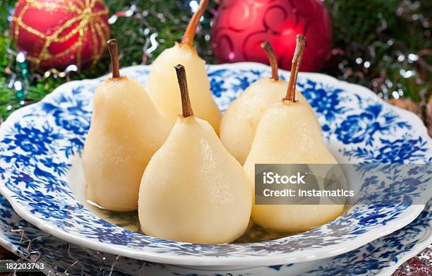 Pere Cotte - Fotografie stock e altre immagini di Natale - Natale, Pera, Affogato - Cibo cotto