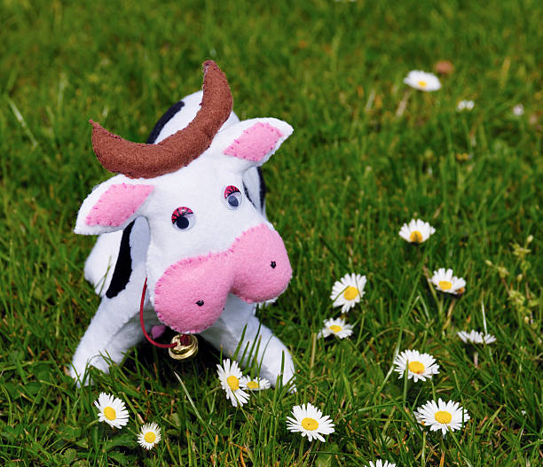 Felt cow at the lawn