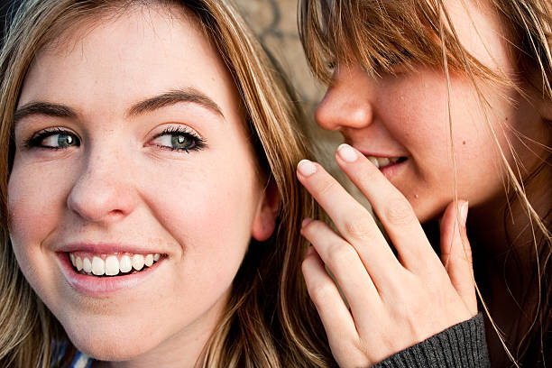 istock Teenage Girls Telling Secrets 182204420