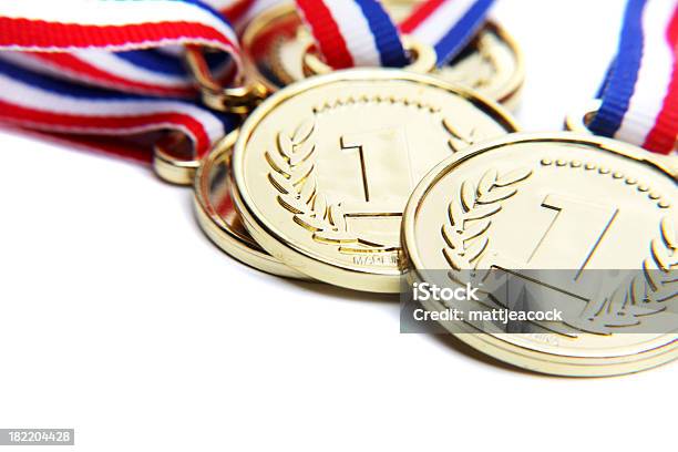 Primeiro Lugar Medalha - Fotografias de stock e mais imagens de Medalha - Medalha, Troféu, Azul