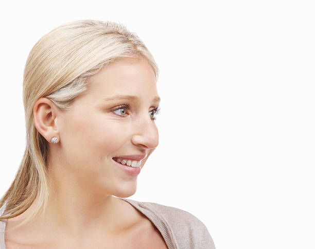 istock Happy young woman looking at copy space 182204678