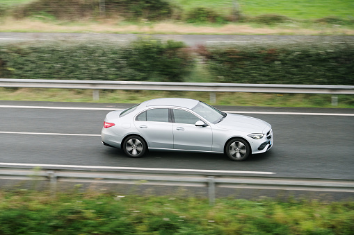 Santander, Spain - 29 November 2023: A Mercedes-Benz E Class in motion on a highway