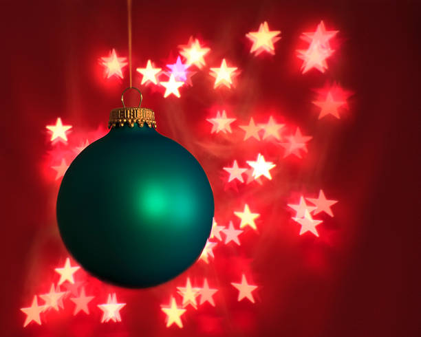 istock Blue christmas bauble and starry background 182207717
