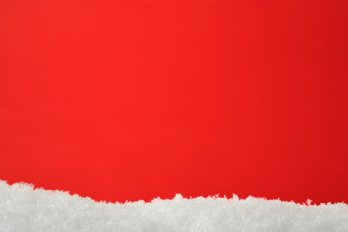 Red Christmas and Holiday Background with Artificial Snow
