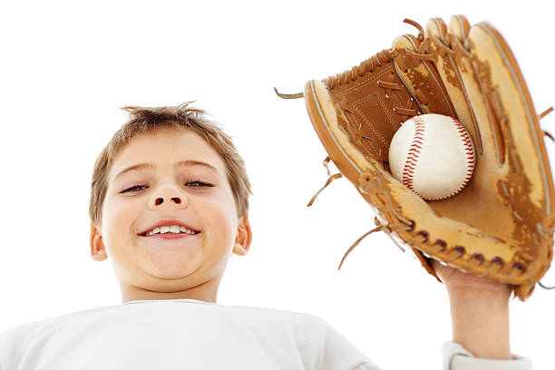 istock Happy boy holding baseball glove and ball 182207848