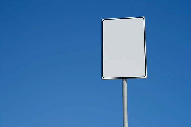 blank signpost blank signpost with blue sky as background. pavement ends sign stock pictures, royalty-free photos & images