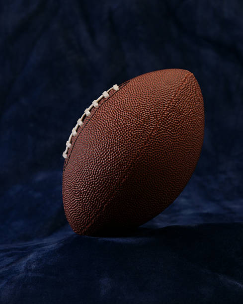 istock Football on blue background 182208600
