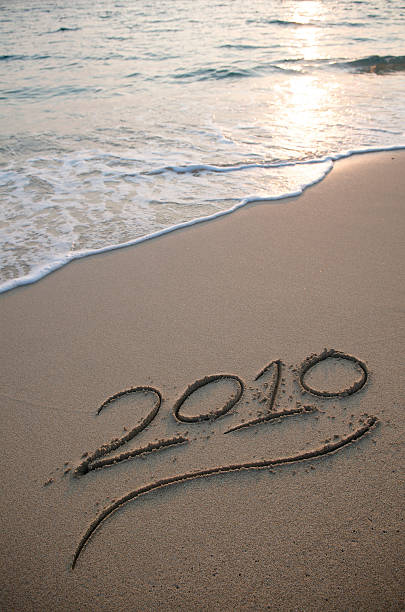 istock Golden Sunset 2010 Message in Sand 182208625