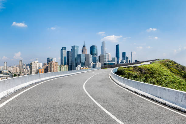 istock Asphalt road and city skyline under blue sky 1822096813
