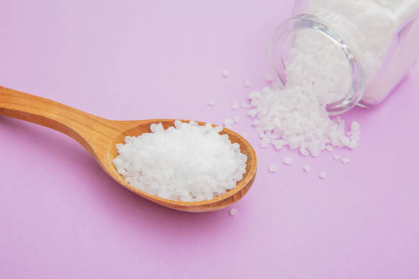 istock Coarse sea salt in a jar and spoon, spa, salt baths, relaxation concept 1822101033