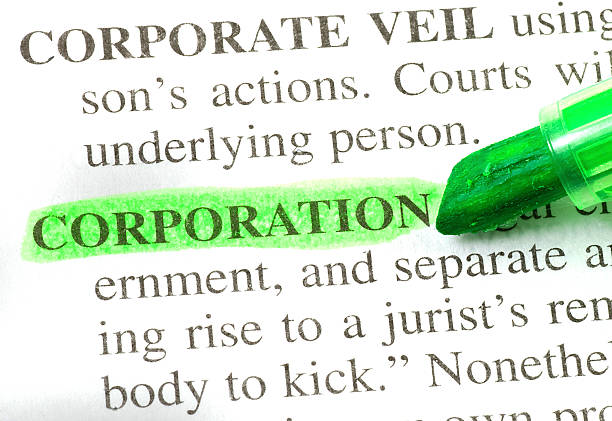 istock Corporation definition highligted in dictionary 182210455