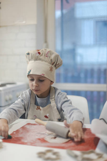 istock Child making Christmas cookies 1822108092