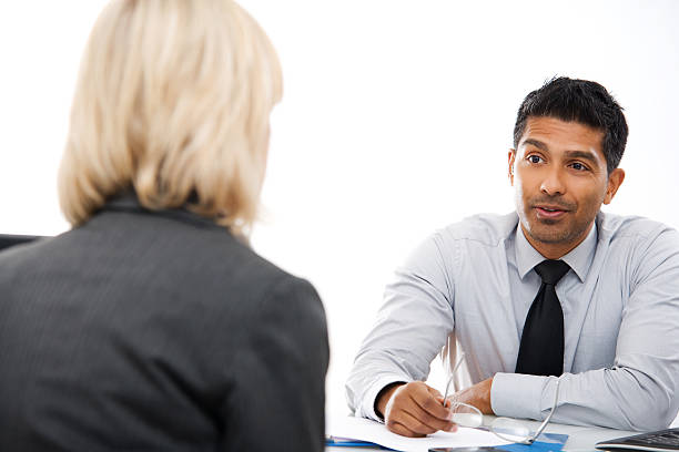 Business Consultation Man with Female Client stock photo