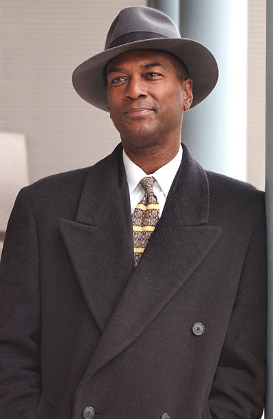 istock businessman in coat 182211430