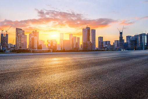 Asphalt highway and city skyline at sunset in Shenzhen, Guangdong province, China.