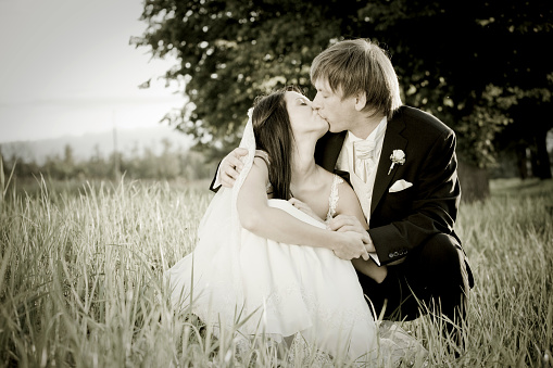 Romantic and attractive newly wed couple (black and white)