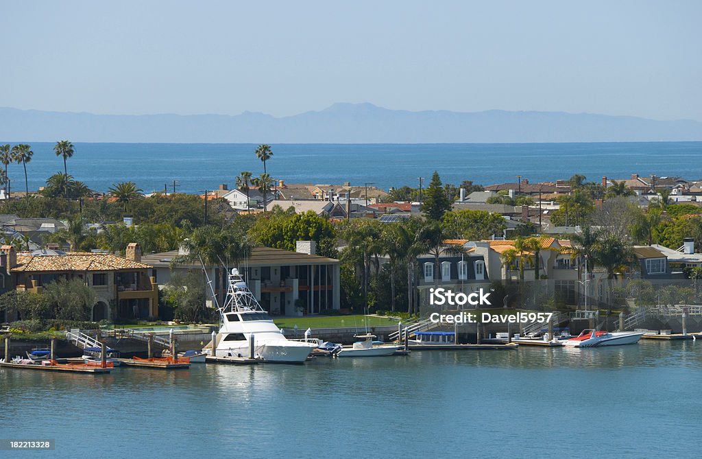 Newport Beach Harbor and Ocean view "A view of Newport Harbor in Newport Beach, CA, with Balboa Island in the Foreground, and the Ocean and the mountains of Catalina Island in the background." Island Stock Photo
