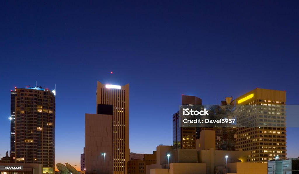 Phoenix Downtown buildings at Dawn "Phoenix Downtown highrise buildings at dawn, backlit by the dawn sky.  Can be used for a dusk picture as well." Office Building Exterior Stock Photo