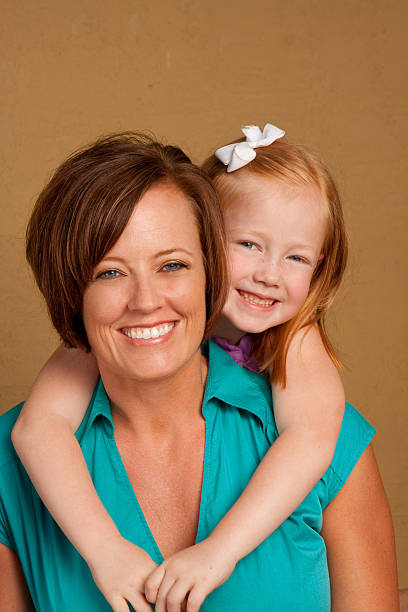 istock Mother and daughter laughing 182213809