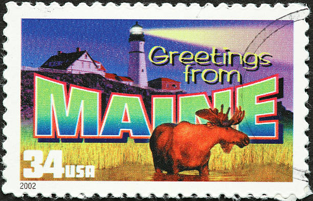 istock Maine moose and lighthouse on stamp 182214056
