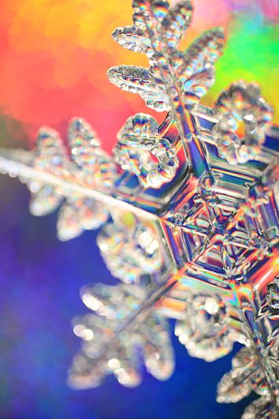 Rainbow background snowflake stock photo