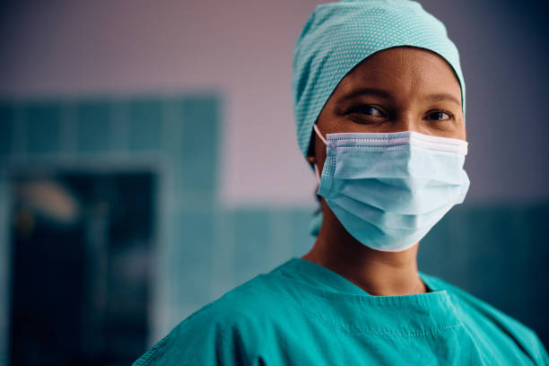 istock Happy black surgical nurse looking at camera. 1822146083