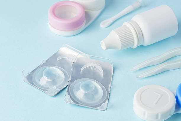 istock Contact lenses and accessories with solution on blue background 1822147680