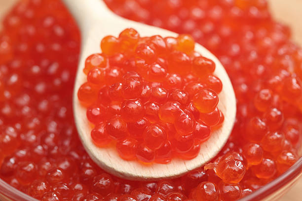 istock Red caviar on a wooden spoon 182214779